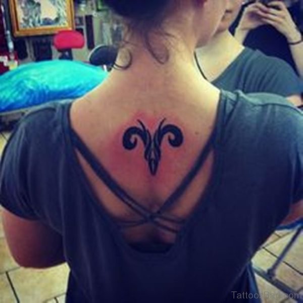 Simple Aries Tattoo Design for Women on Back