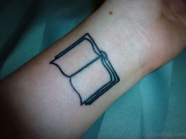 Simple Book Tattoo On Wrist