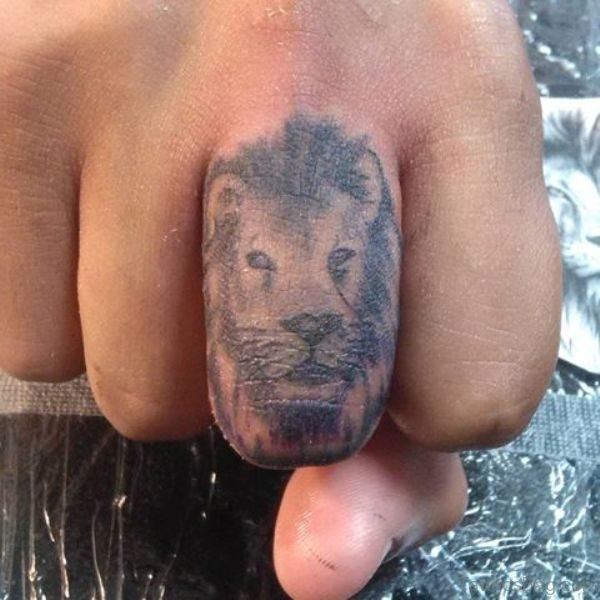 Simple Lion Tattoo On Finger