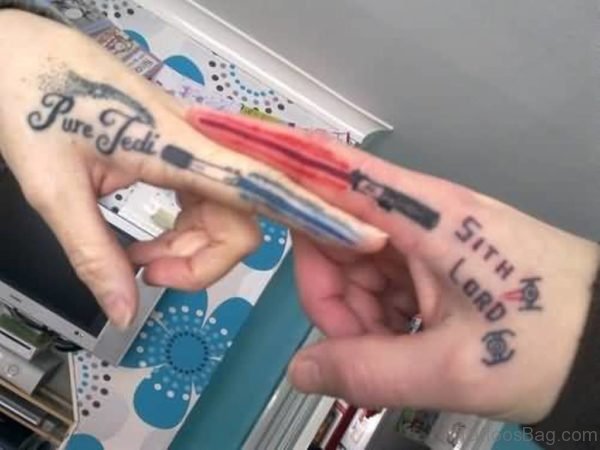 Simple Sword Tattoo On Finger