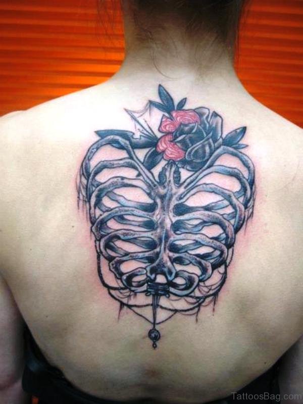 Skeleton With Flower Tattoo On Back