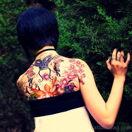 Skull And Flowers Back Tattoo