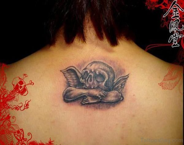 Skull Tattoo On Upper Back