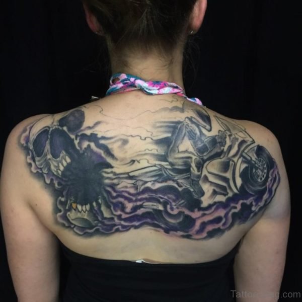 Skull Tattoo On Upper Back
