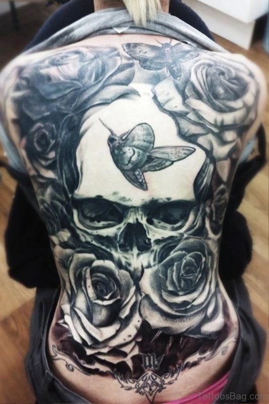 Skull With Rose And Bird Tattoo
