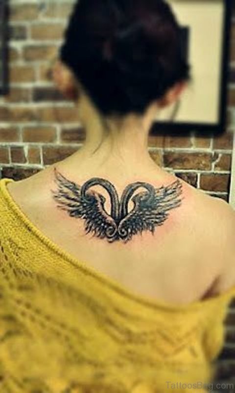 Small Aries Tattoo On Upper Back