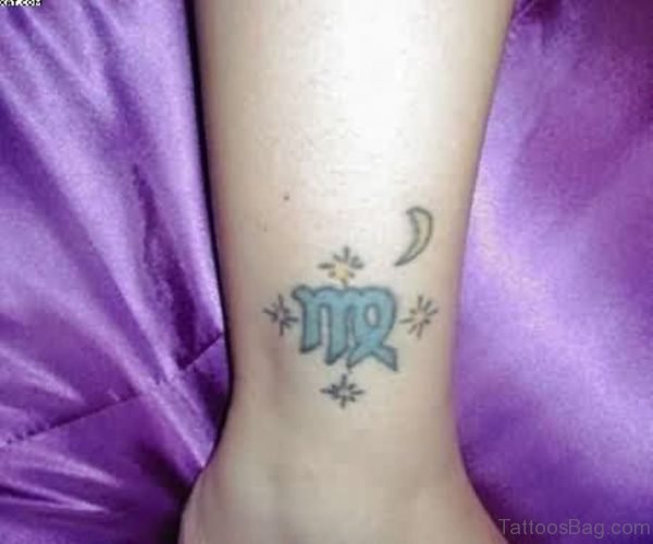 Small Blue Ink Virgo Zodiac Tattoo For Ankle