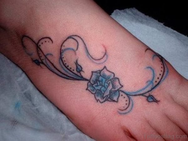 Small Blue Rose Foot Tattoo