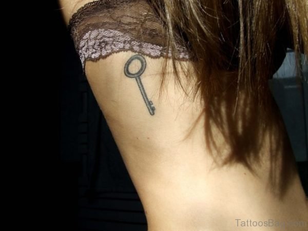 Small Key Tattoo On Rib