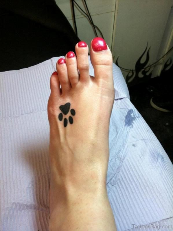 Smallish Paw Tattoo On Foot
