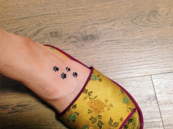 Stunning Paw Tattoo On Foot