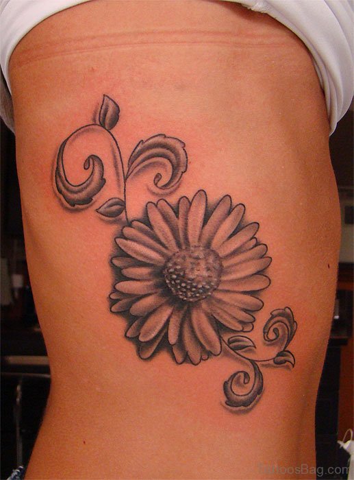 Stylish Daisy Flower Tattoo On Rib