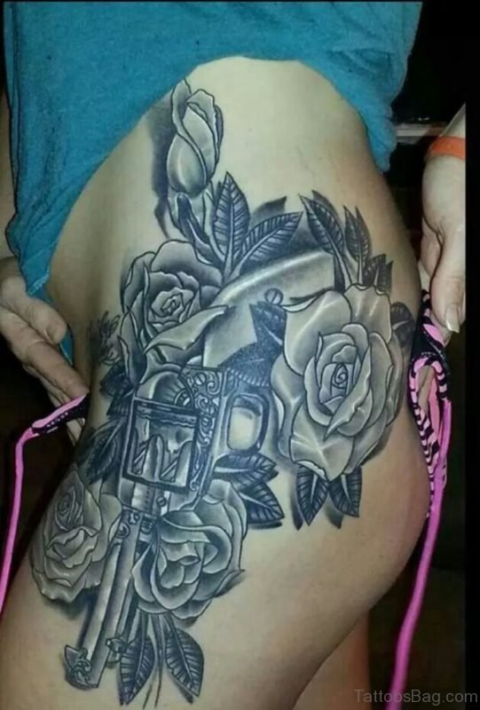 Stylish Gun Tattoo On Thigh