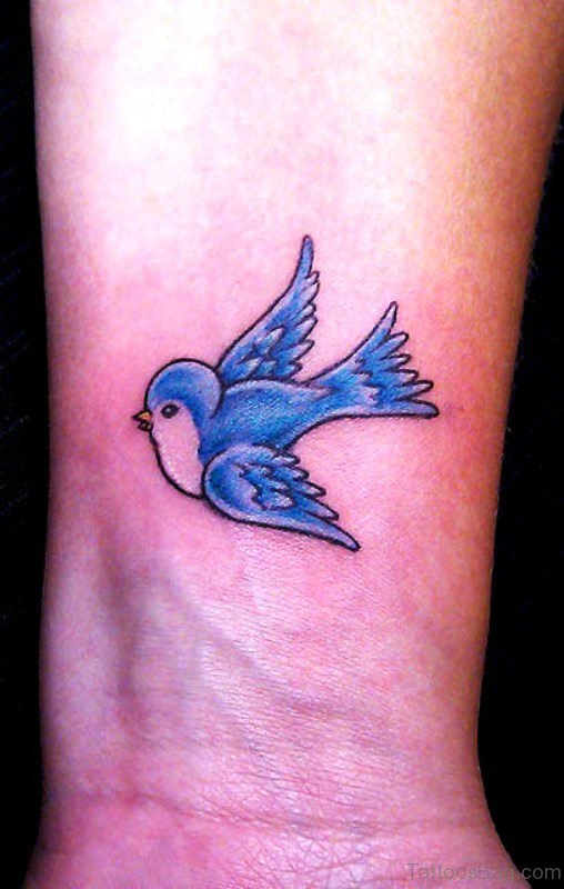 Sweet Blue Bird Tattoo On Wrist