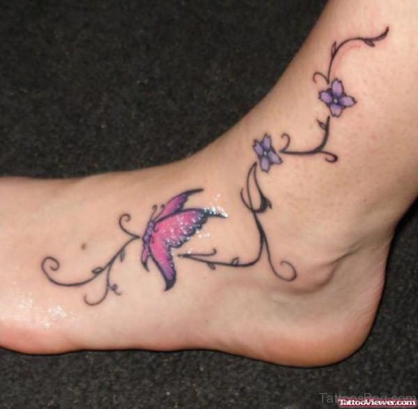 Swirly Butterfly Tattoo On Foot