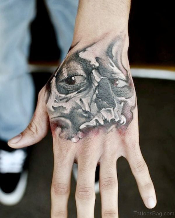 Terrific Hand Skull Tattoo For Guy