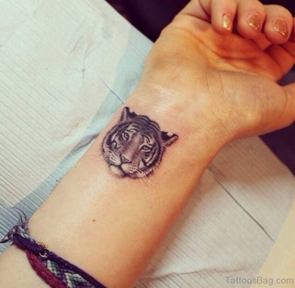 Tiger Face Tattoo On Wrist 