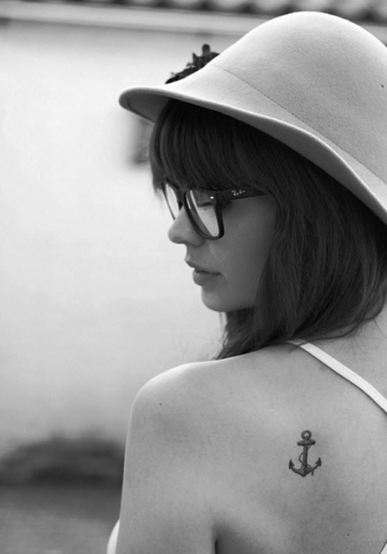 Tiny Anchor Tattoo On Back Shoulder