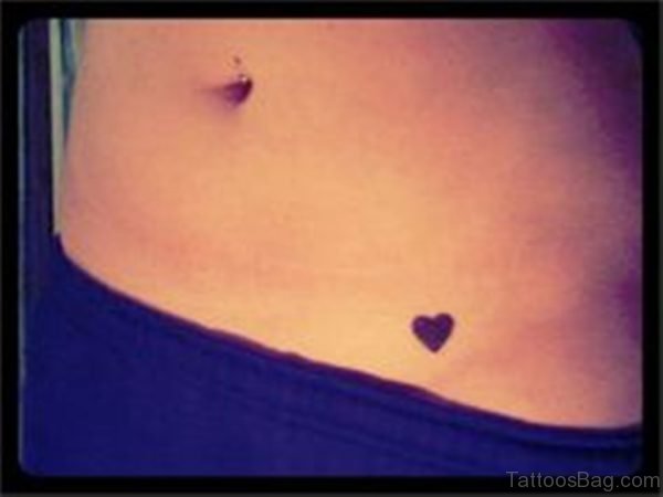Tiny Black Heart Tattoo On Waist
