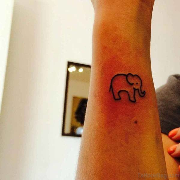 Tiny Elephant Tattoo On Forearm