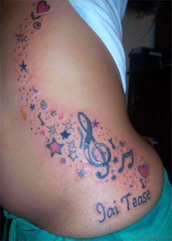 Tiny Heart Stars And Music Notes Tattoos On Ribs To Waist