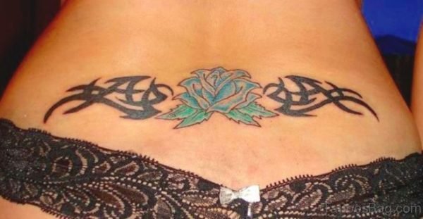 Tribal And Blue Rose Tattoo On Waist