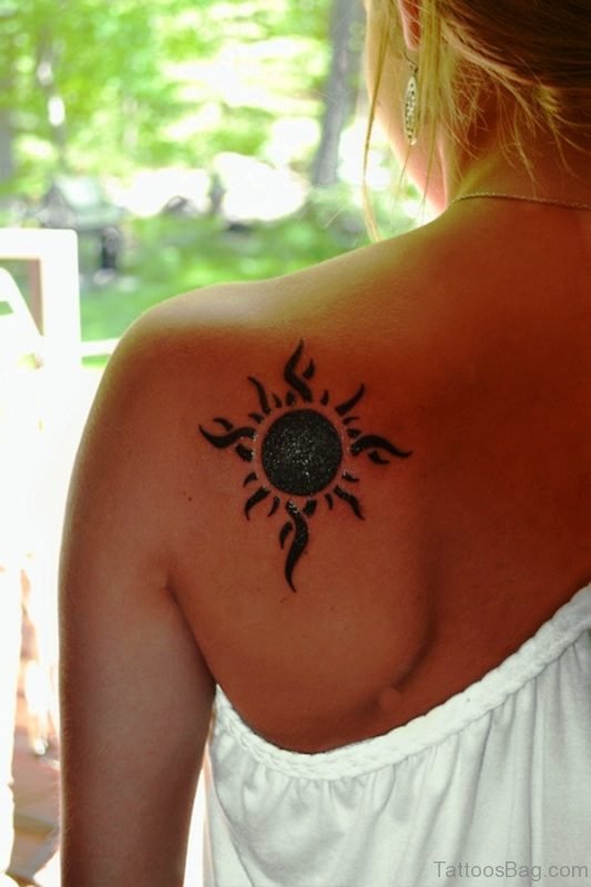 Tribal Black Sun Tattoo On Back Shoulder