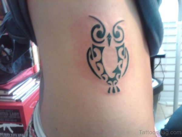 Tribal Owl Tattoo On Rib 