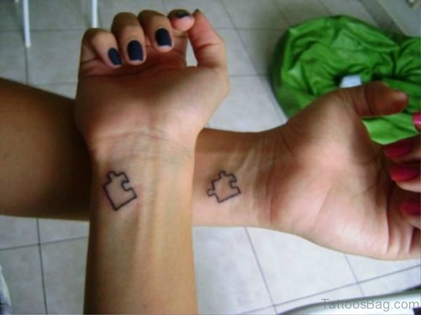 Two Autism Tattoos On Both Wrist