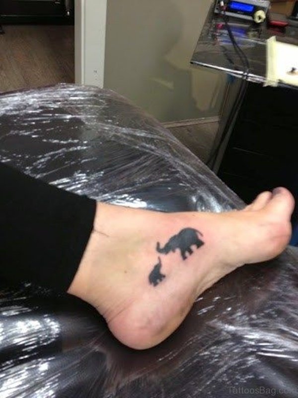 Two Black Elephant Tattoo On Foot