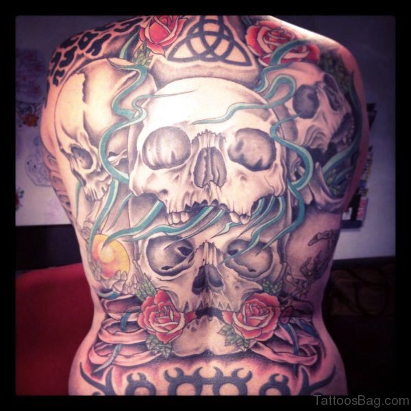 Two Skulls With Roses Tattoo On Back