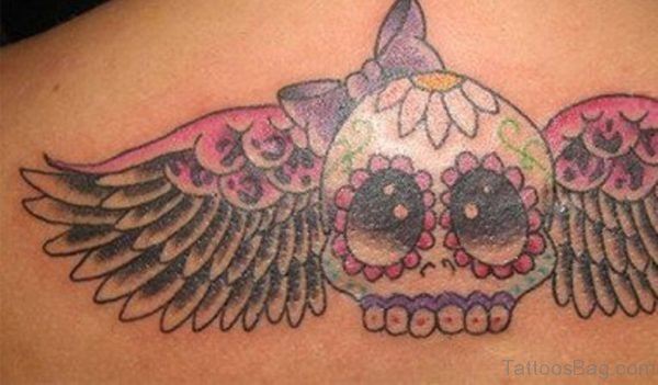 Winged Sugar Skull Tattoo On Upperback