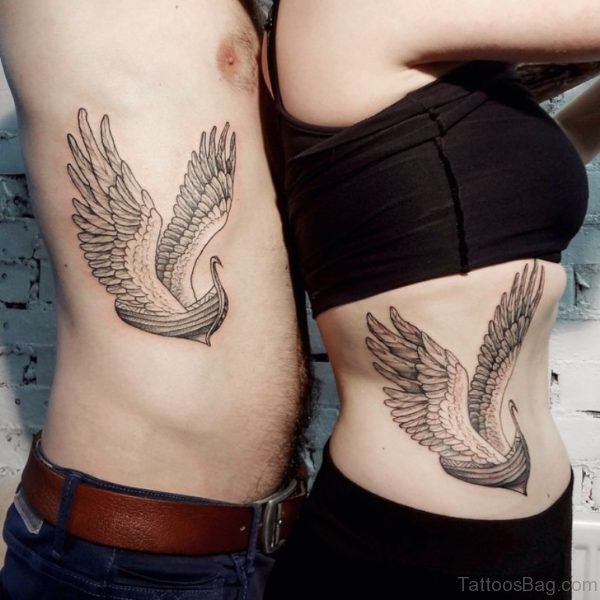 Wings Tattoo On Rib 