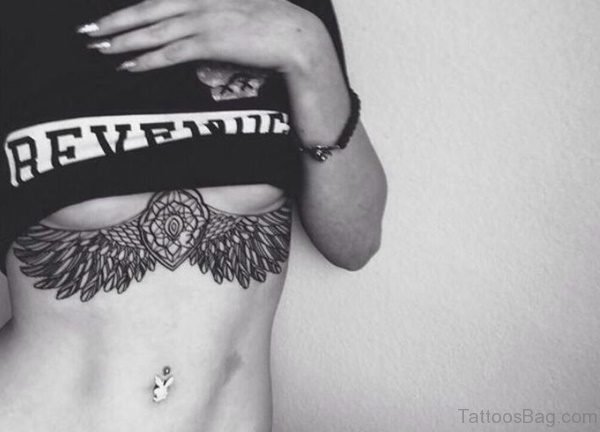Wings Tattoo On Stomach 