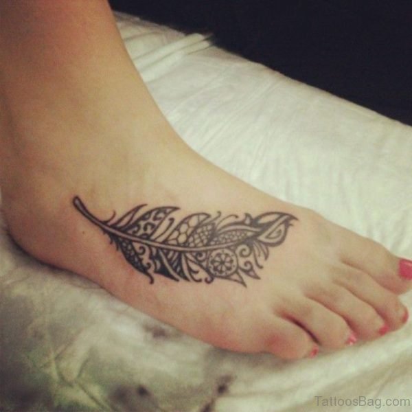 Wonderful Feather Tattoo On Girl Foot