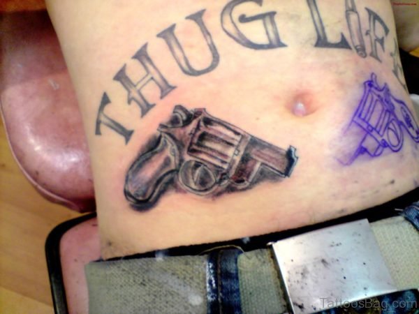Wonderful Gun Tattoo On Waist