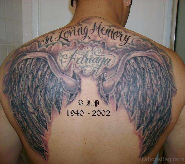 Wording And Angel Wings Tattoo 