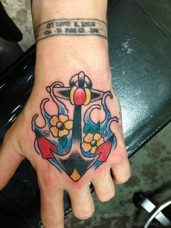 Yellow Flower And Anchor Tattoo