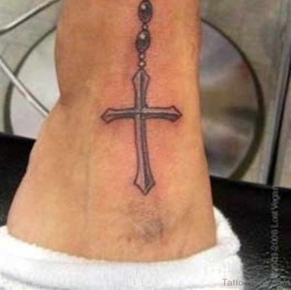 Rosary tattoos on foot and ankle