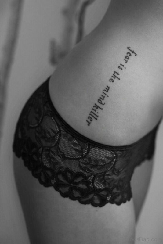 Vertical quote tattoo