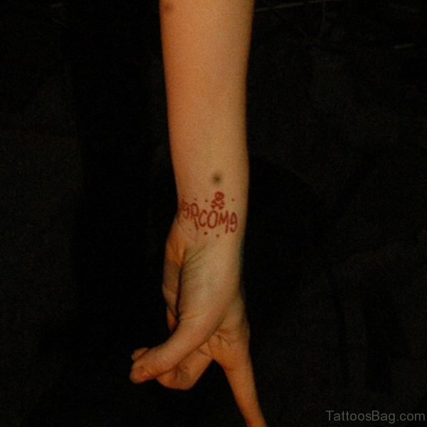 Amazing Brown Tattoo On Wrist
