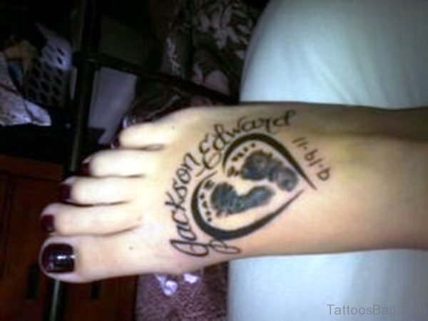 Baby Footprints Tattoo On Heart Outline