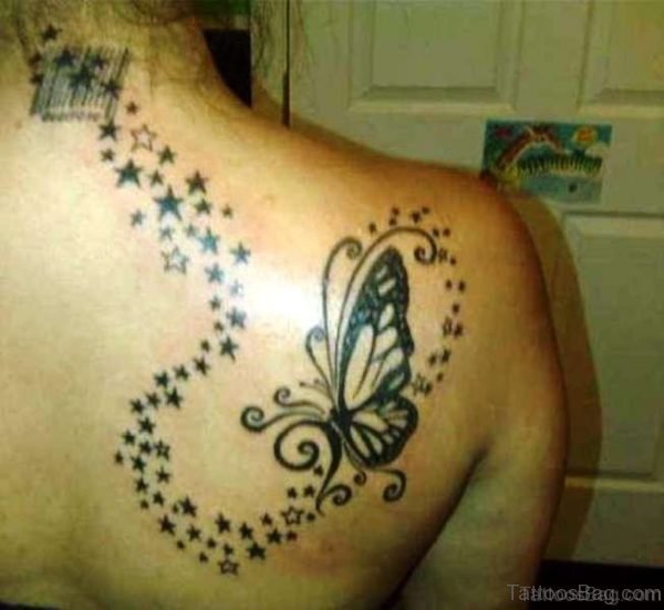 Black Ink Butterfly And Star Tattoo