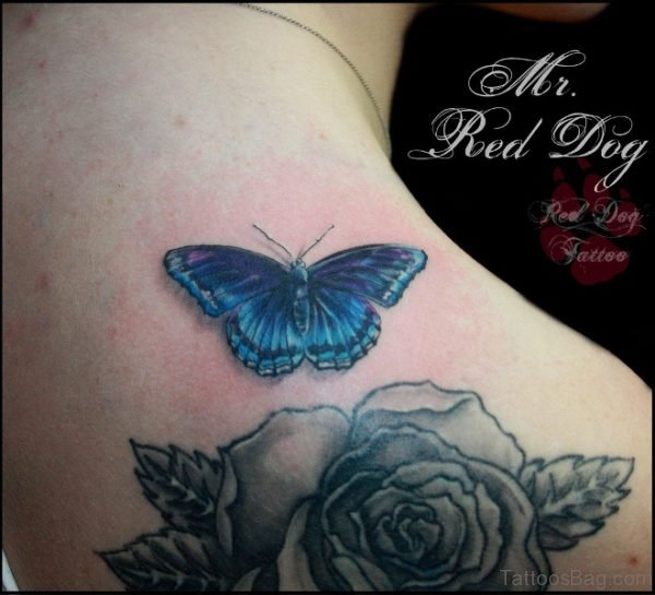Blue Butterfly And Grey Flower Tattoo