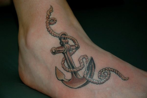 Brown Anchor Tattoo On Foot