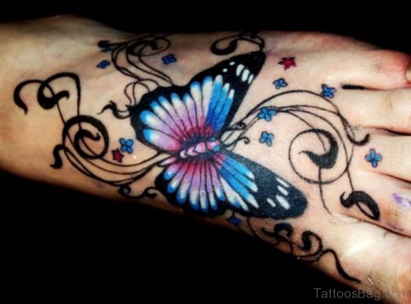 Dark Ink Butterfly And Star Tattoo