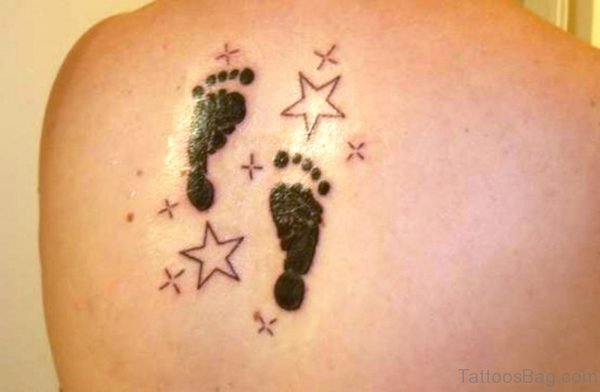 Footprints With Stars Tattoo On Shoulder