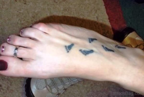 Great Baby Footprints Tattoo On Foot
