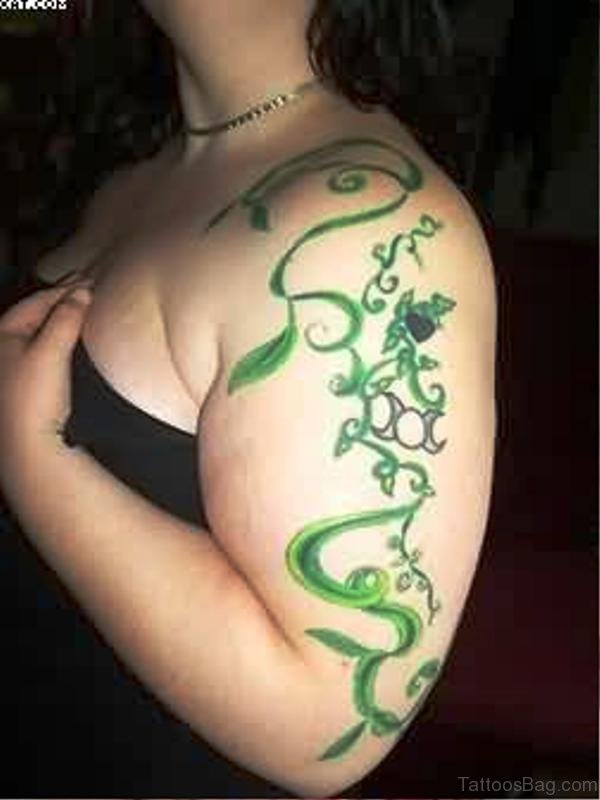 Green Vine Tattoo On Arm