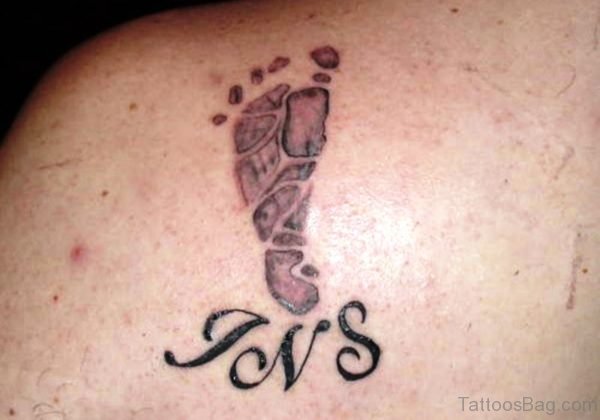 Grey Inked Footprint Tattoo 1
